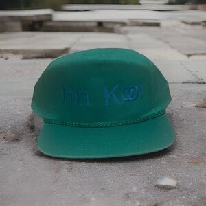 Green Novelty Cap with Blue Embroidery